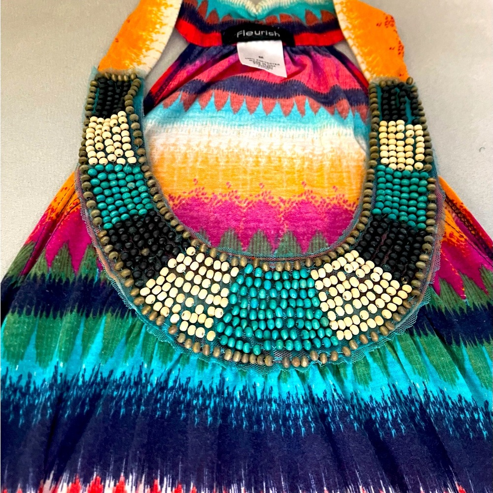 Multi colored sleeveless top, with beaded neckline